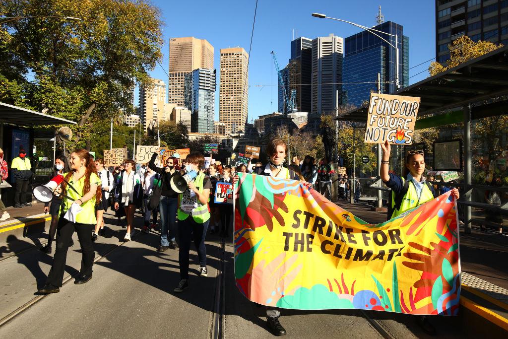 Protesters take part in the School Strike 4 Climate rally in Melbourne, Australia, on May 21, 2021. (Graham Denholm/Getty Images)