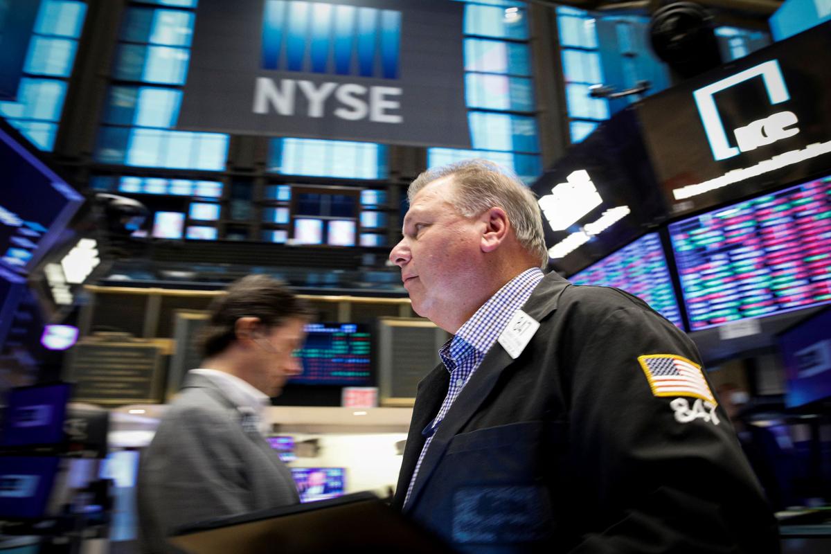 Wall Street Closes Up on Infrastructure Gains but Tesla Weighs