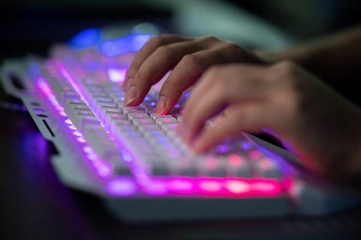 A hacker uses his computer at his office in Dongguan, Guangdong province, China, on Aug. 4, 2020. (Nicolas Asfouri/AFP via Getty Images)
