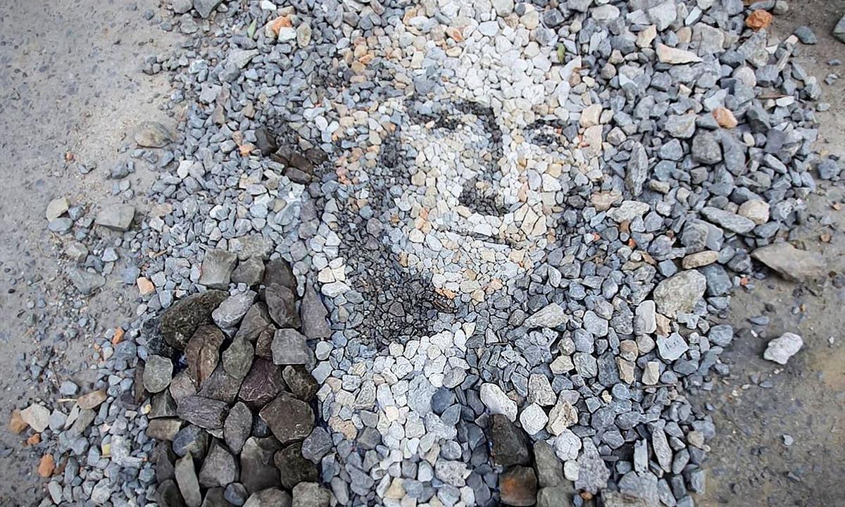 Land Artist ‘Paints With Pebbles’ to Make Masterpiece Portraits and Lifelike Faces in Jungles of Thailand
