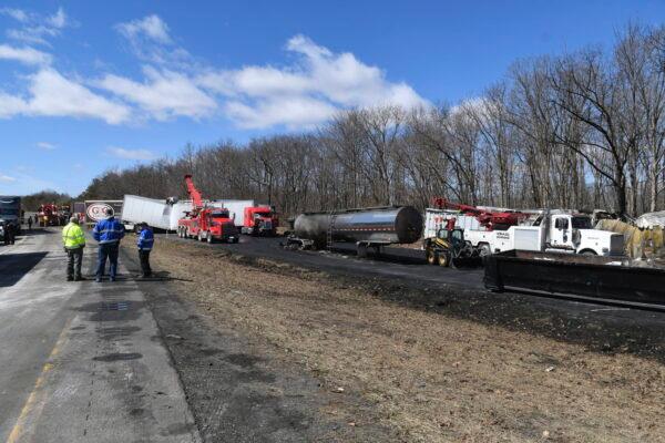 Semi trucks are strewn about I-81 north in Foster Township after Monday's deadly multi-vehicle crash on both I-81 northbound lanes in Schuylkill County, Pa., on March 29, 2022. (Lindsey Shuey/The Republican-Herald via AP)