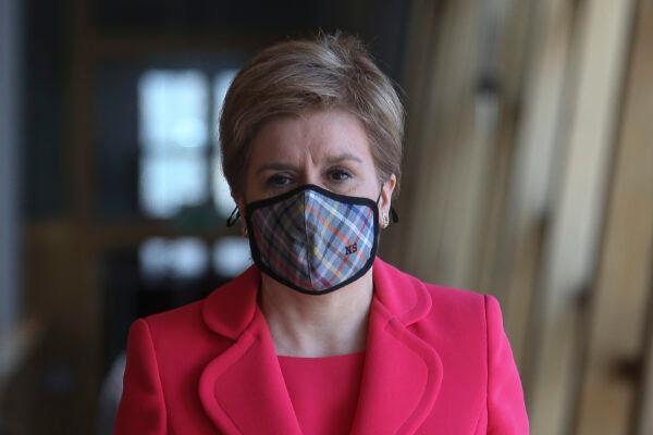 First Minister of Scotland Nicola Sturgeon attends the Scottish Parliament to give updates on changes to COVID-19 restrictions including the wearing of masks, in Edinburgh, Scotland, on March 30, 2022. (Fraser Bremner - Pool/Getty Images)