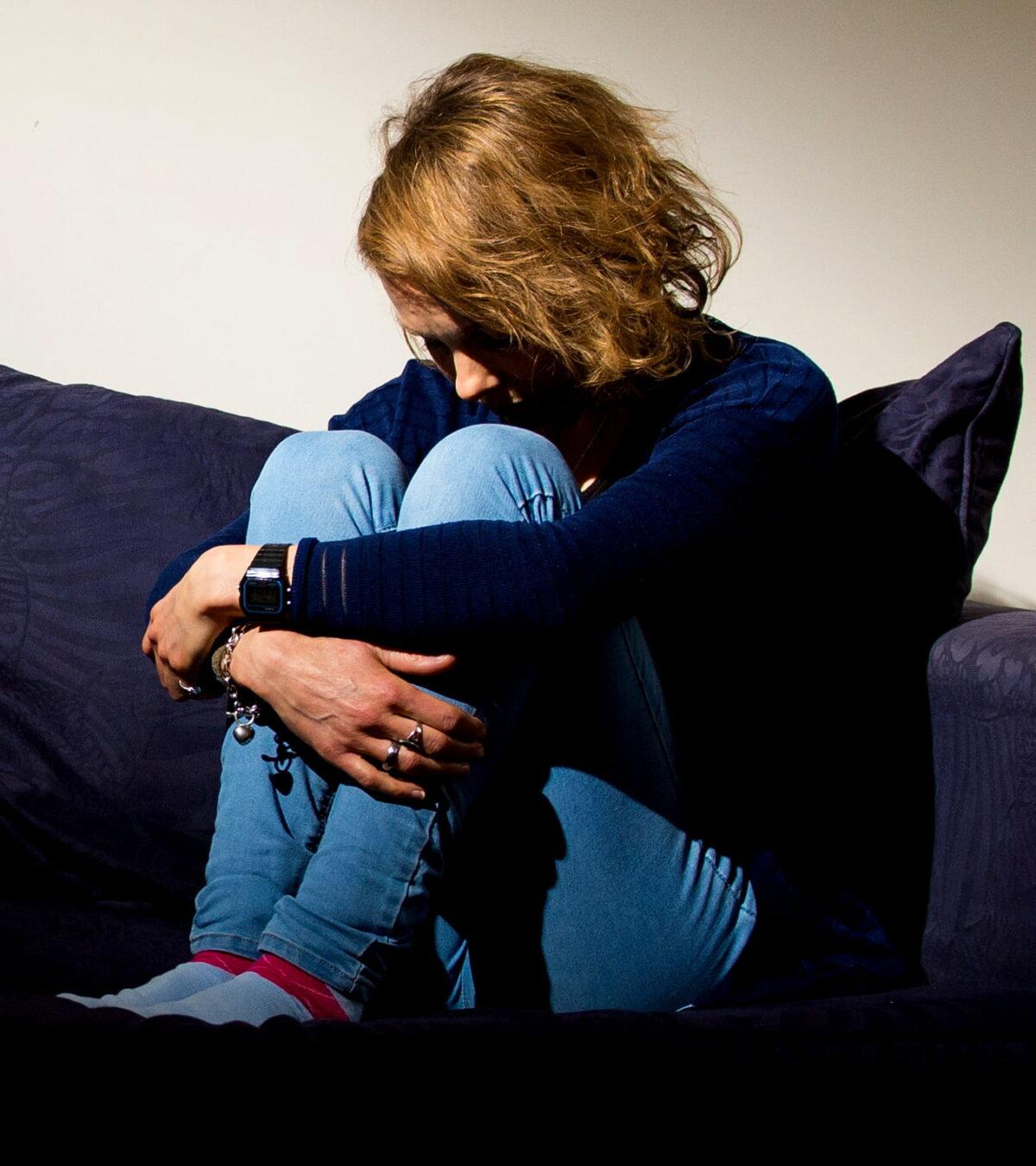 A woman showing signs of depression. (Dominic Lipinski/PA)