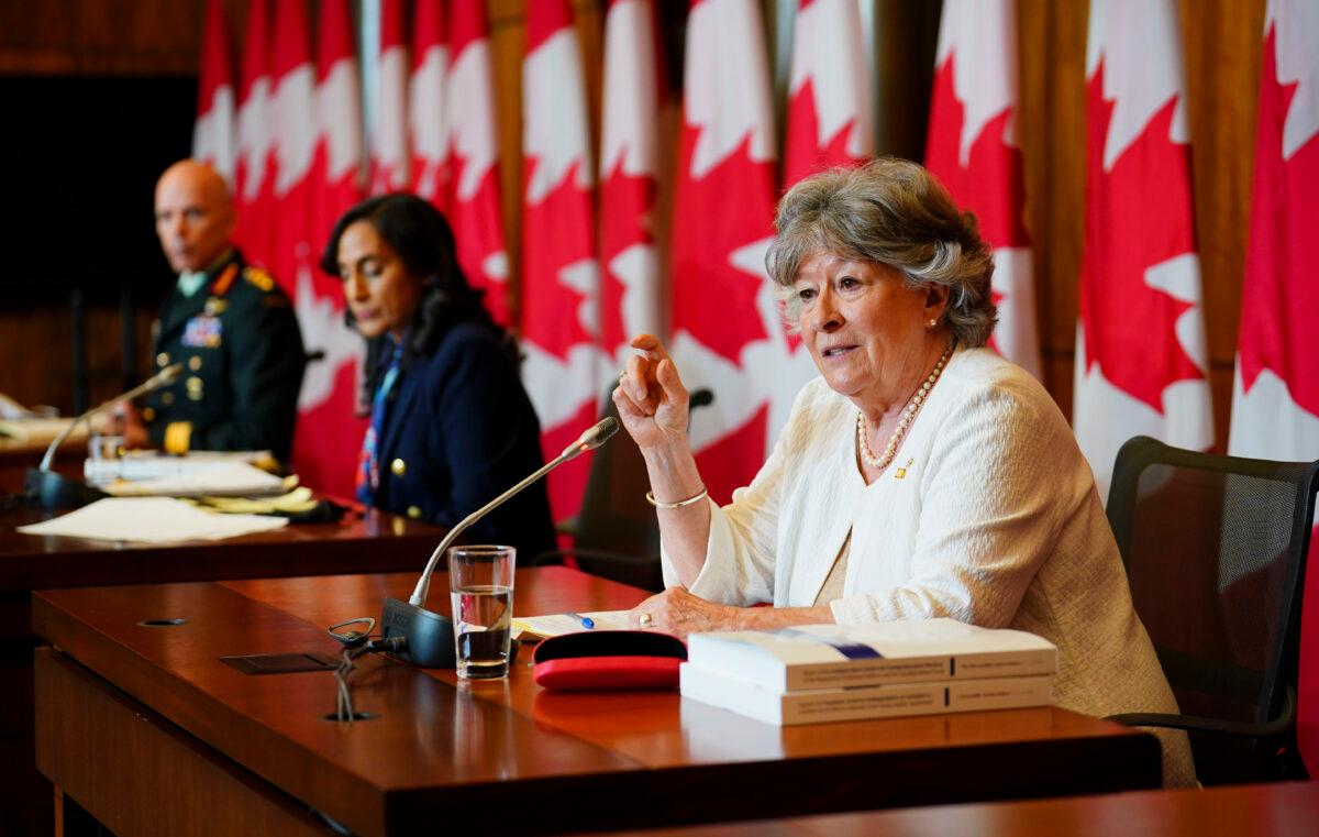 Former Supreme Court Justice Louise Arbour (R) and then-Minister of National Defence Anita Anand (C) release the final report of the Independent External Comprehensive Review Into Sexual Misconduct and Sexual Harassment in the Department of National Defence and the Canadian Armed Forces, in Ottawa on May 30, 2022. (The Canadian Press/Sean Kilpatrick)