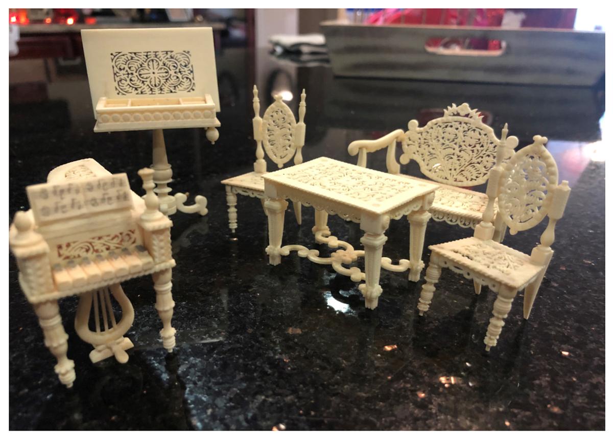 Best of Treasures: Photograph on Easel in Dollhouse Furniture Set Increases Collector Desirability