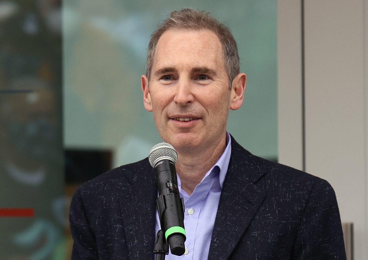 Amazon CEO Andy Jassy speaks at the ceremonial ribbon cutting prior to opening night for the NHL's new franchise, the Seattle Kraken, at the Climate Pledge Arena in Seattle on Oct. 22, 2021. (Bruce Bennett/Getty Images)
