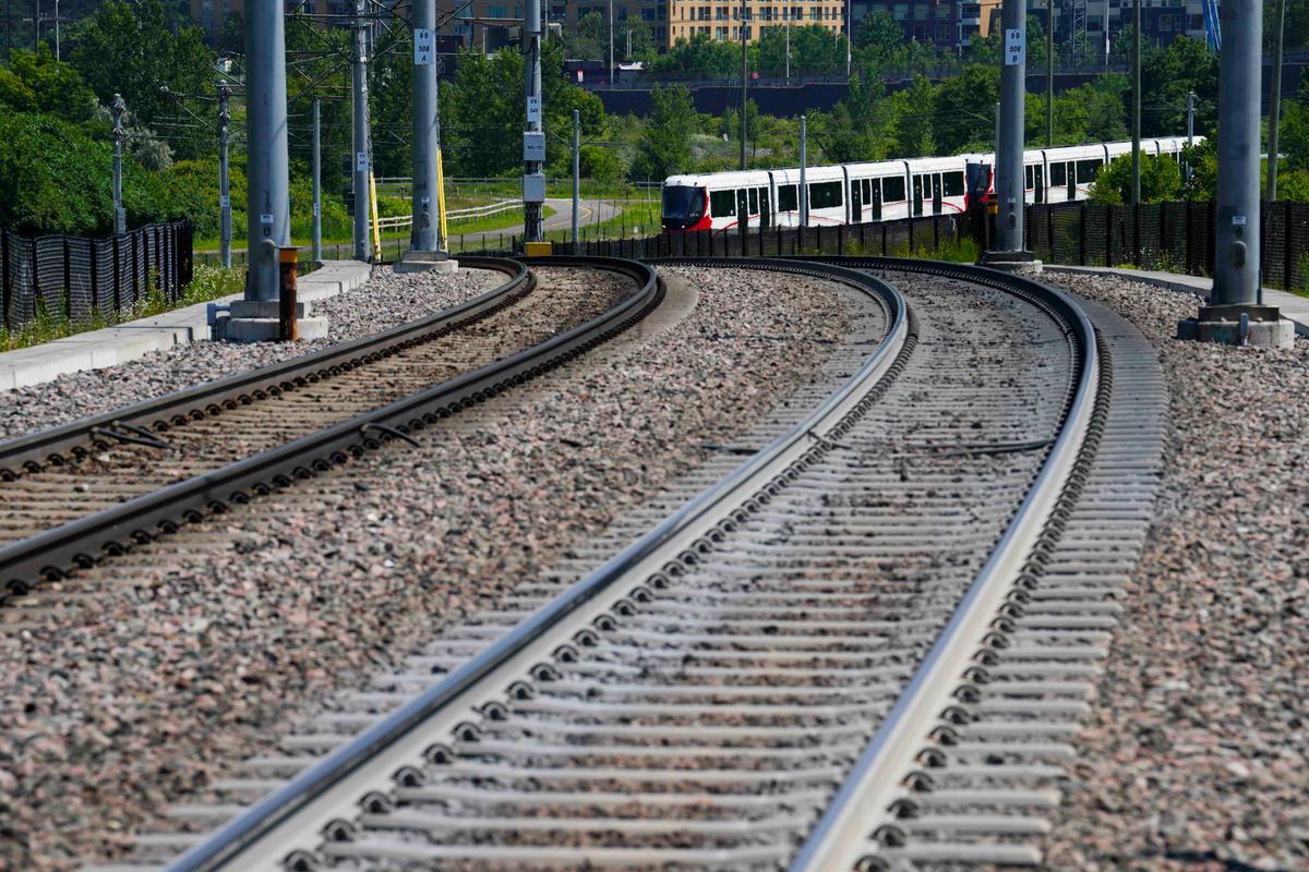 Woman Dozes Off on Train Tracks, Escapes Injury as Train Screeches to Halt