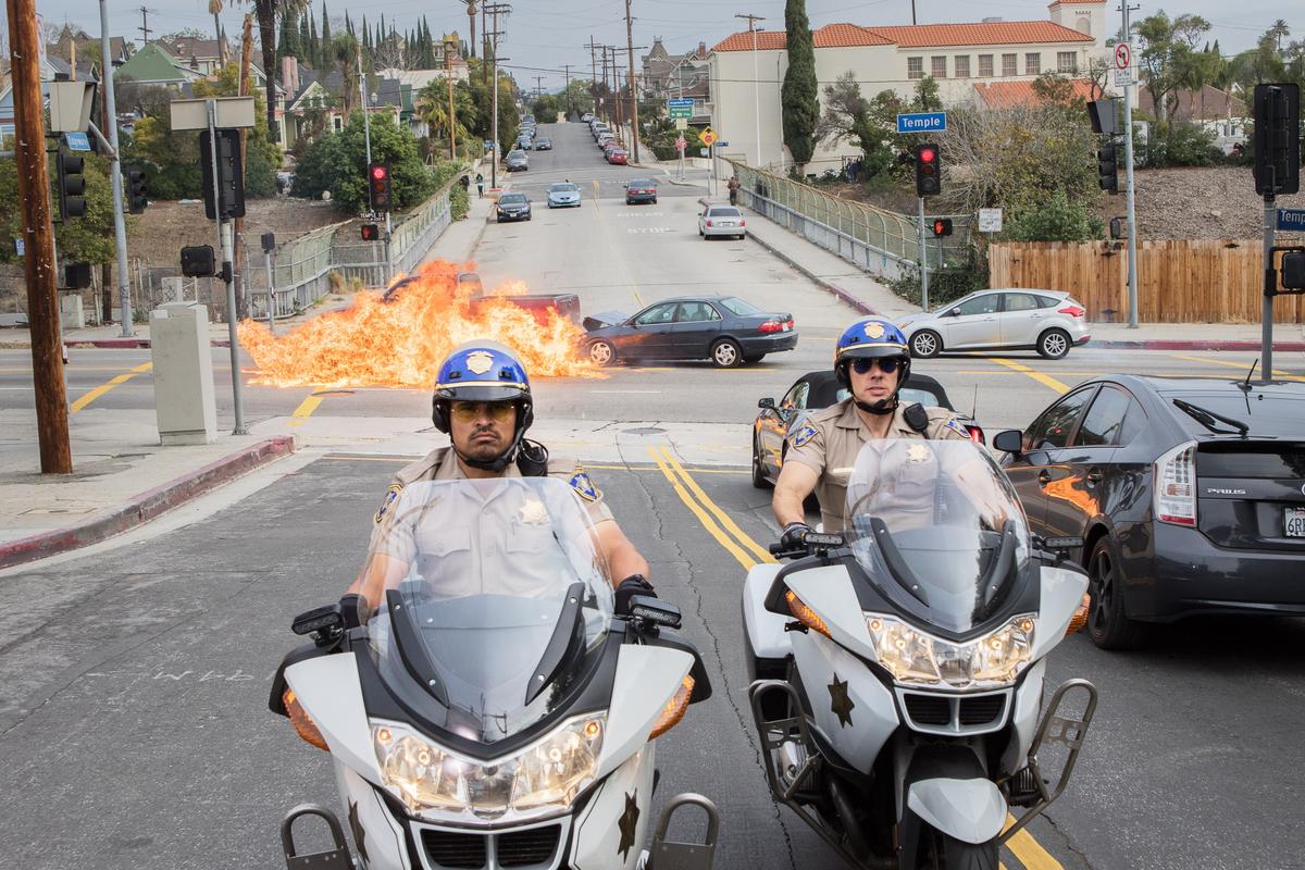Ponch (Michael Peña, L) and Jon (Dax Shepard) in Warner Bros. Pictures' action comedy "CHIPS." (Peter Iovino/Warner Bros. Entertainment Inc./Ratpac-Dune Entertainment LLC)