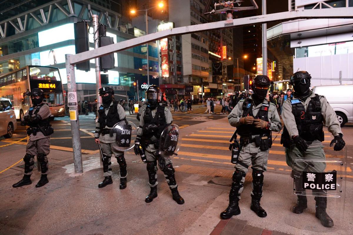 DOJ Accused Survivor of Police Brutality, of ‘Disliking’ Hong Kong Police