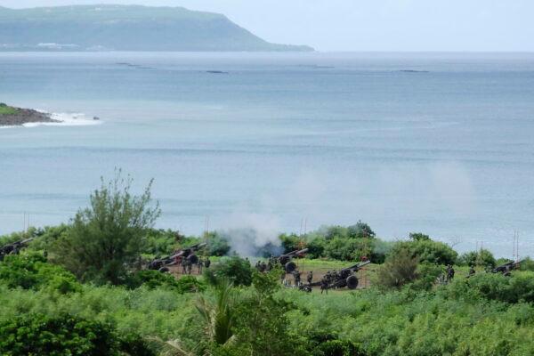 The Taiwanese military conducts artillery drills in Fangshan Township, Pingtung County, Taiwan, on Nov. 9, 2022. (Johnson Lai/AP Photo)