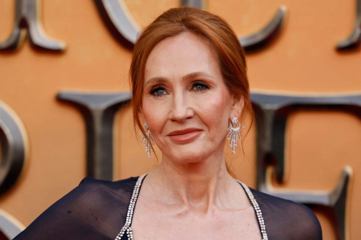 British writer JK Rowling poses on the red carpet after arriving to attend the World Premiere of the film "Fantastic Beasts: The Secrets of Dumbledore" in London on March 29, 2022. (Tolga Akmen/AFP via Getty Images)