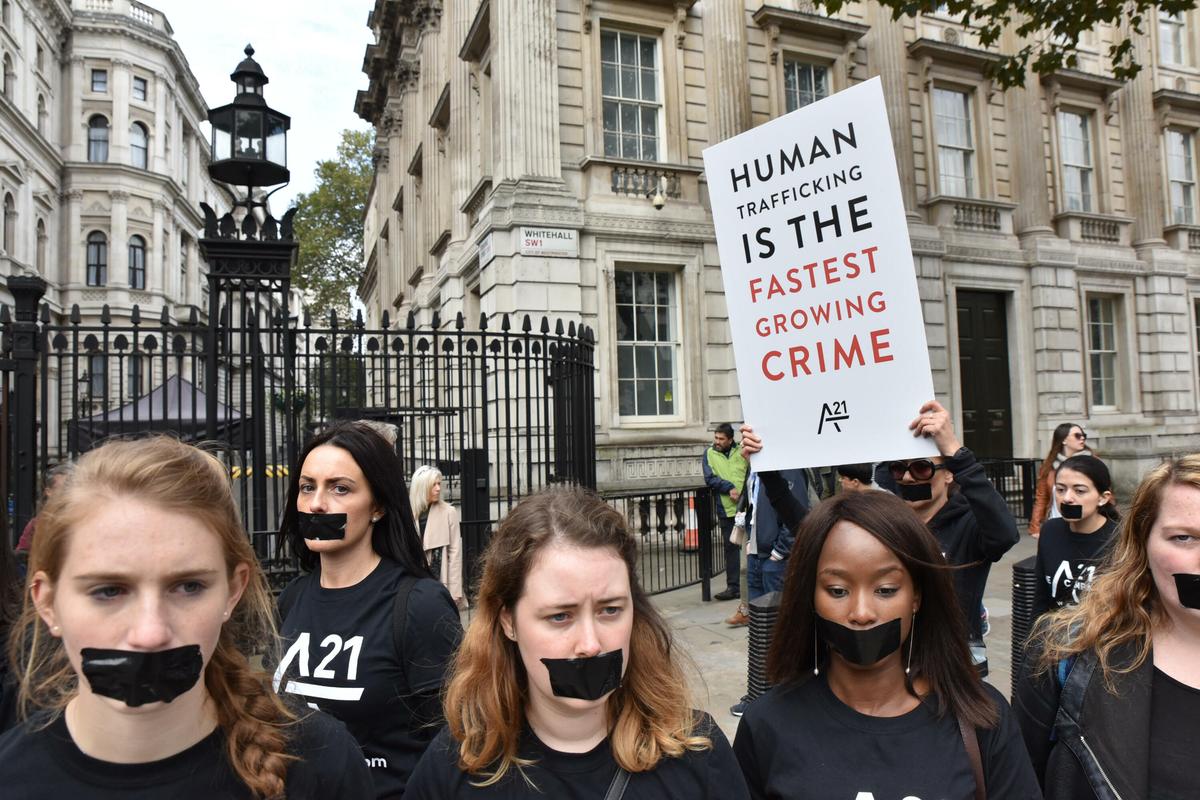 A silent march against modern slavery in London in 2016. Because human trafficking is often a "hidden crime," data on trafficking victims is unreliable. (Alamy/PA)