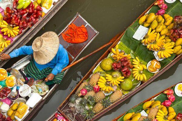 A floating market in Thailand selling fruits and vegetables, which are a possible source of probiotic Bacillus spores. izzetugutmen/iStock/Thinkstock