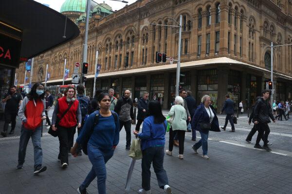 Pedestrians move past the the Queen Victoria Building in Sydney, Australia, on Oct. 18, 2022. (Lisa Maree Williams/Getty Images)