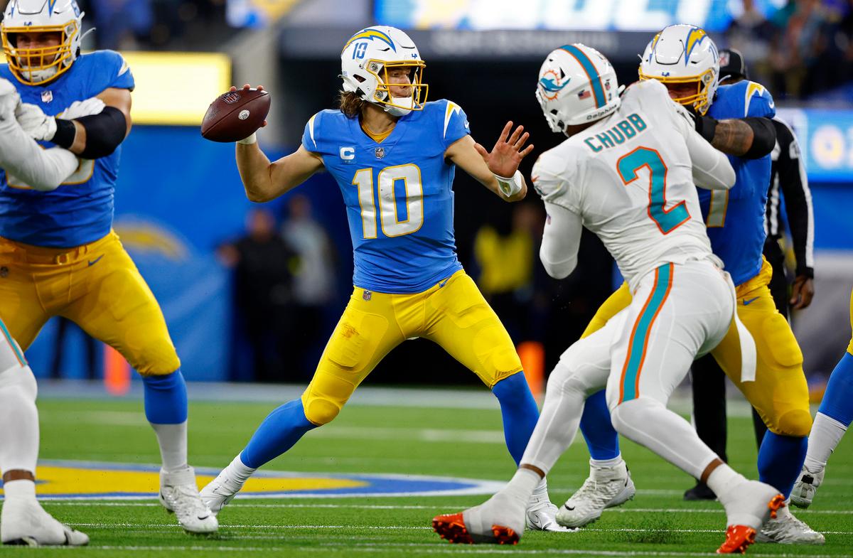Herbert, Short-Handed Defense Lead Chargers Past Fins 23–17