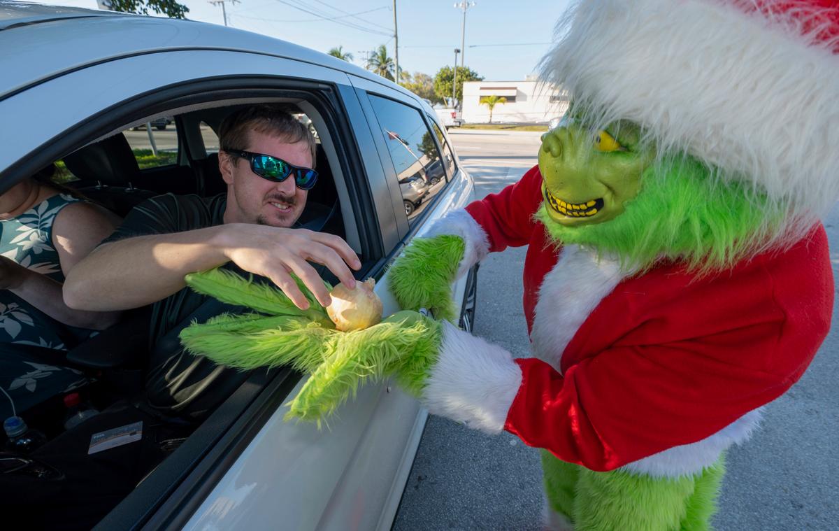 Deputy Dressed as Grinch Gives Onions to Speeding Drivers