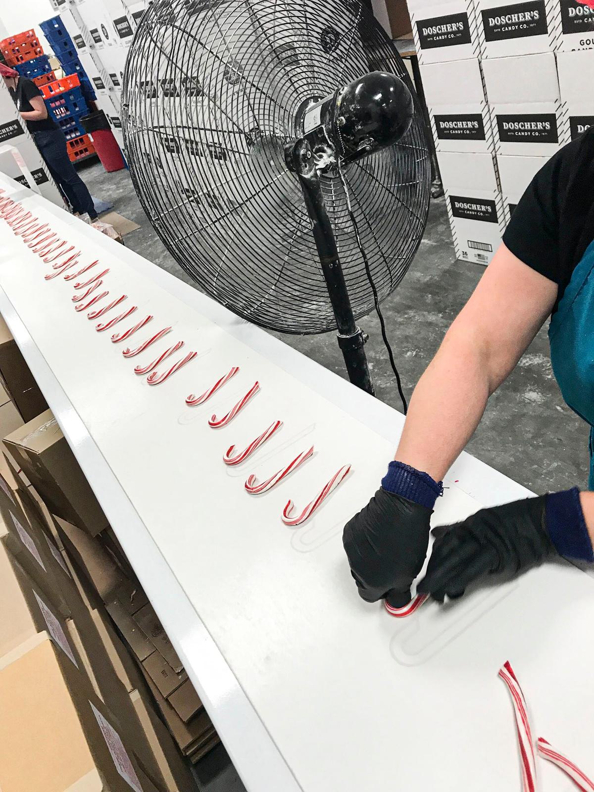 Each candy cane at Doscher’s Candies is hooked by hand. (Courtesy of Greg Clark)