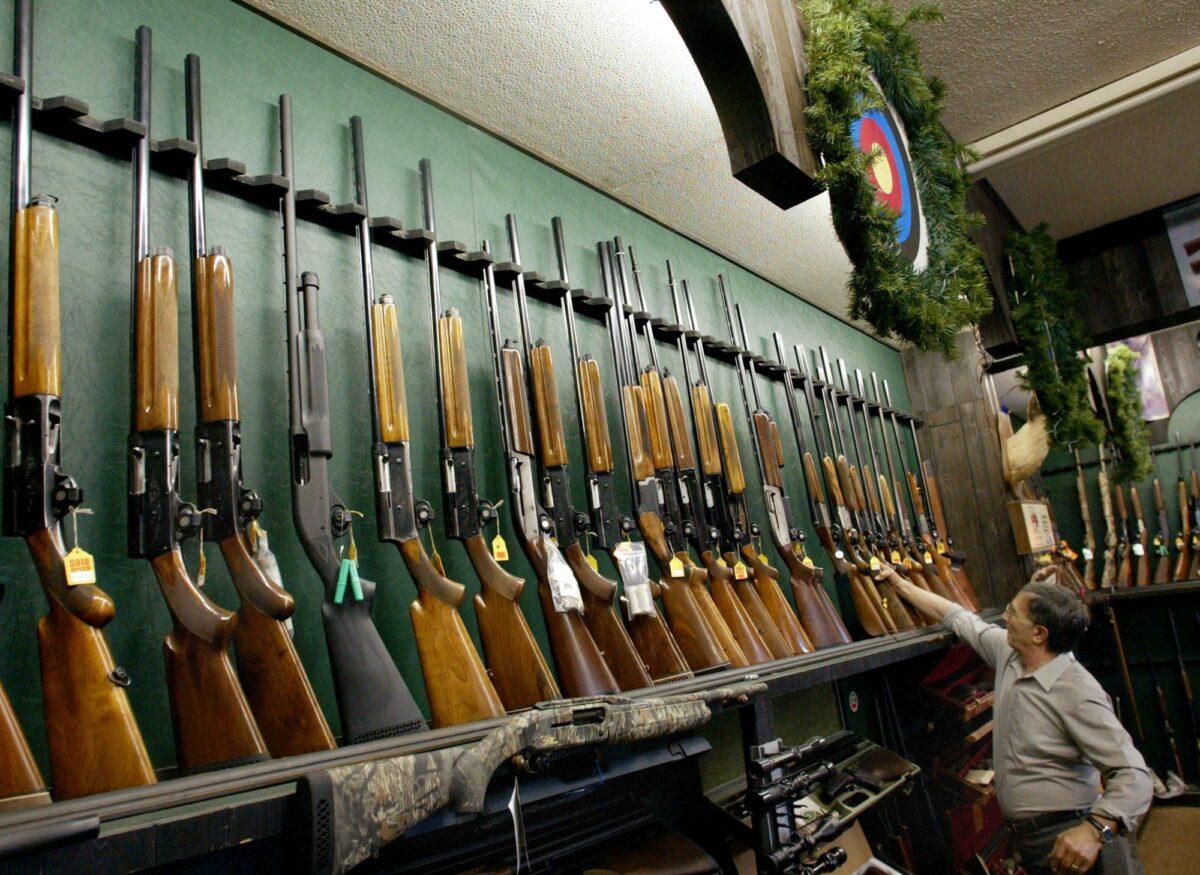 Hunting rifles and shotguns at a gun store in Toronto in a file photo. (The Canadian Press/Kevin Frayer)