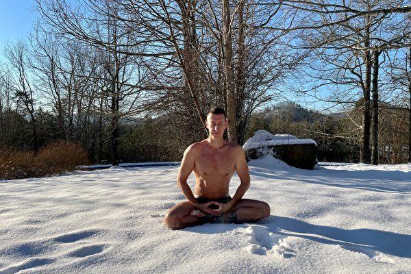 Evrard meditating in the snow. (Photo courtesy of Evrard)