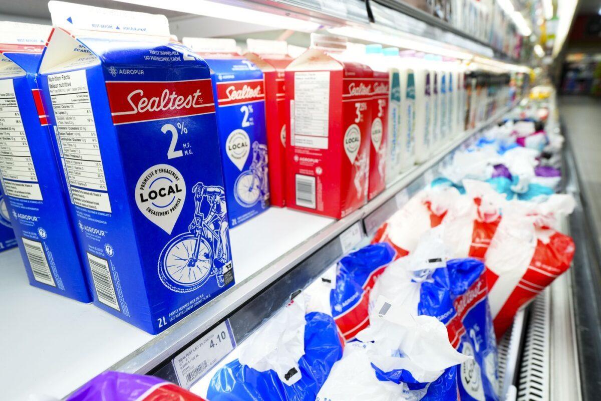 Milk and dairy products are displayed for sale at a grocery store in Aylmer, Que., in a file photo. (The Canadian Press/Sean Kilpatrick)