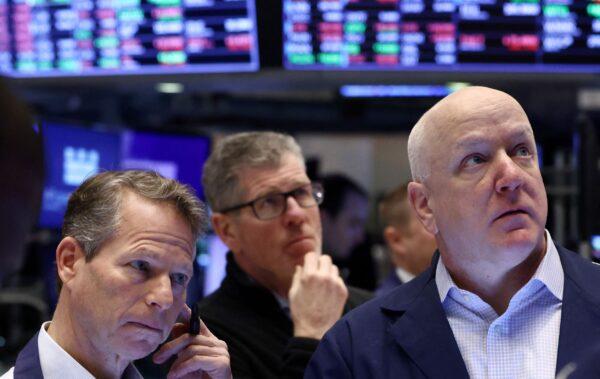 Traders work on the trading floor at the New York Stock Exchange (NYSE) in New York City on Jan. 27, 2023. (Andrew Kelly/Reuters)