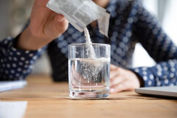 <span class="caption">Rehydration solutions are more effective than flat soft drinks and have less sugar. </span>(fizkes/Shutterstock)