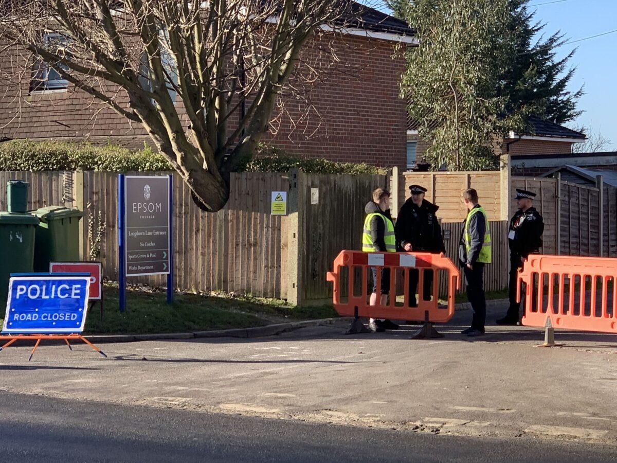 Police at Epsom College in Surrey, England, on Feb. 6, 2023. (Lucas Cumiskey/PA Media)