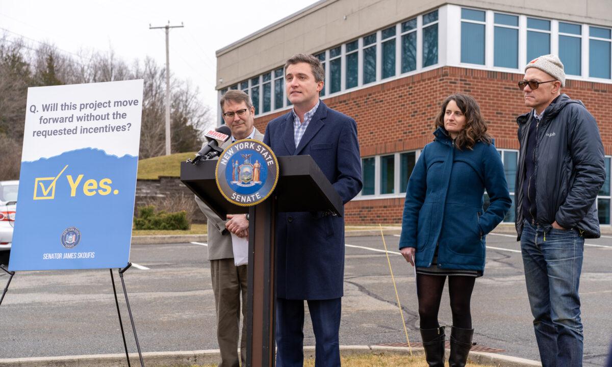 State Sen. James Skoufis speaks in front of the commercial building that houses the Orange County Industrial Development Agency office in New Windsor, N.Y., on Feb. 22, 2023. (Cara Ding/The Epoch Times)
