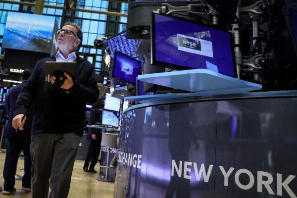 Traders work on the floor of the New York Stock Exchange (NYSE) in New York City on March 2, 2023. (Brendan McDermid/Reuters)