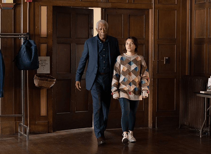 Daniel (Morgan Freeman) and Allison (Florence Pugh) attend an AA meeting, in "A Good Person." (United Artists)