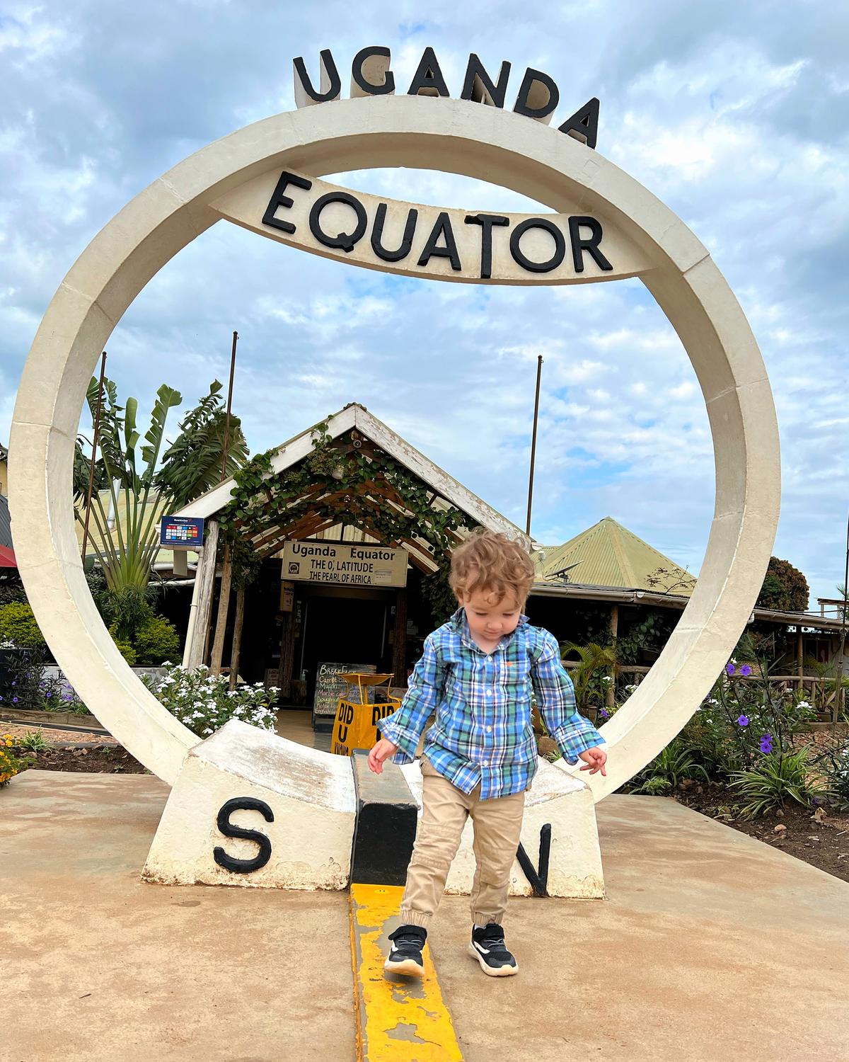 Max Smith, 2, walks on the equator in Uganda in October 2022. (Courtesy of Lesley Carter/TNS)