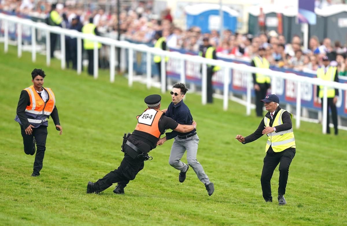 Animal Rights Protester Charged After Running Onto Epsom Racecourse