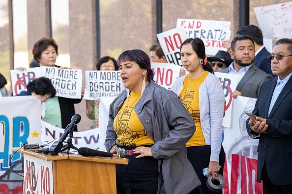 Immigrant advocate groups protest against immigration-related bills outside of the John H. Reagan State Office Building in Austin, Texas, on April 12, 2023. (Suzanne Cordeiro/AFP)