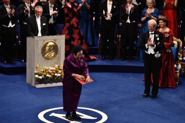 Chief Professor Tu Youyou, laureate of the Nobel Prize in Physiology or Medicine, acknowledges applause after receiving her Nobel Prize at the Nobel Prize Awards Ceremony at Concert Hall on December 10, 2015, in Stockholm, Sweden. (Pascal Le Segretain/Getty Images)