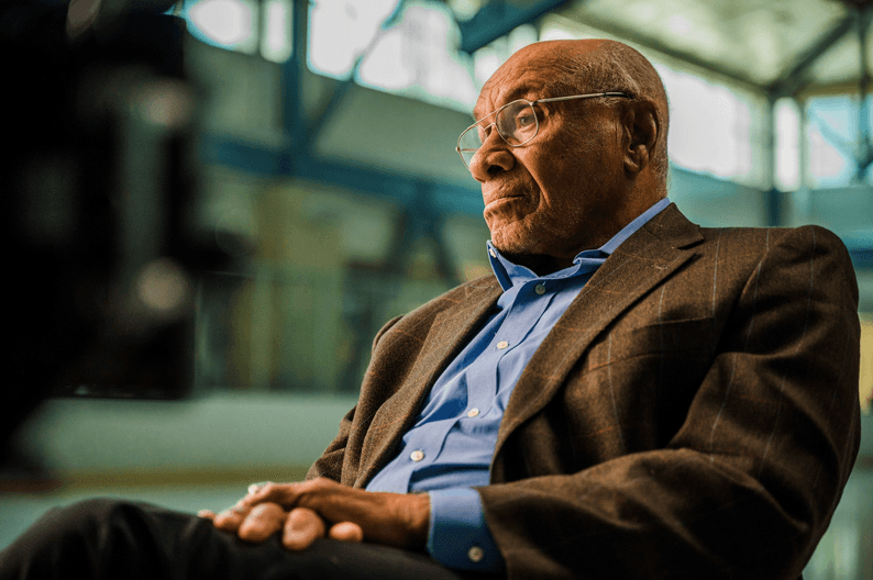 NHL legend Willie O’Ree being interviewed in "Black Ice." (Roadside Attractions)