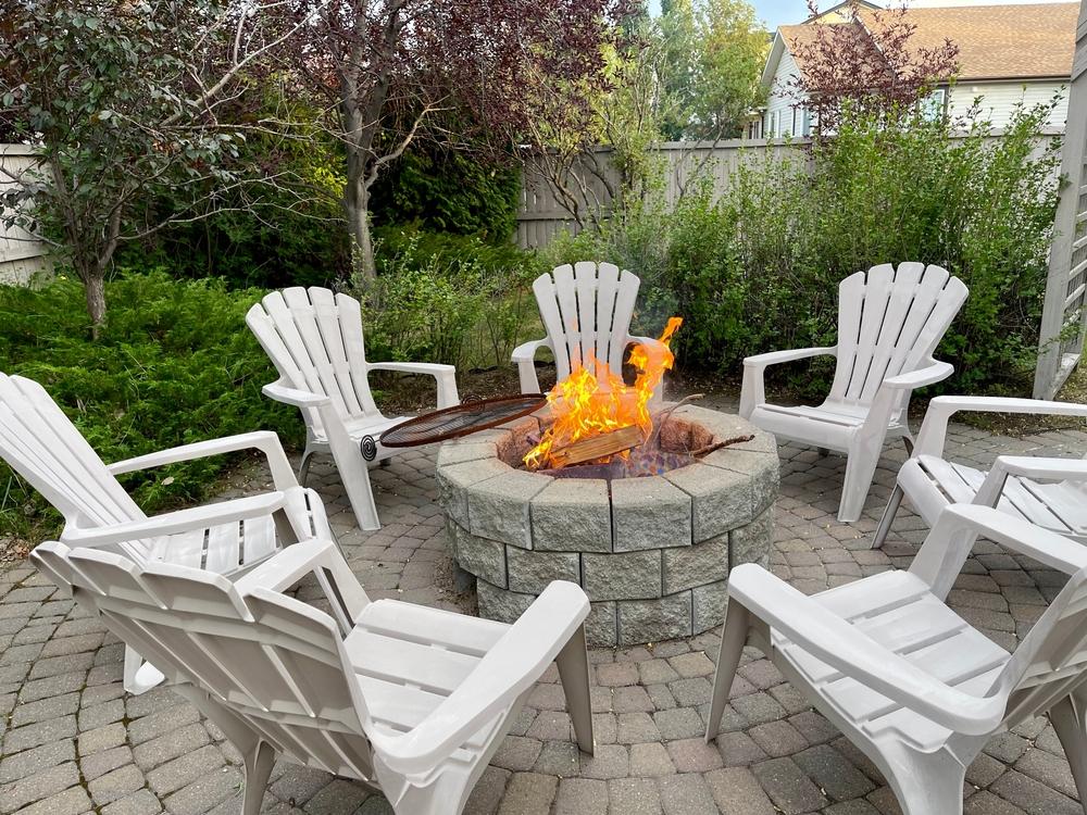 A built-in firepit can be as simple as standalone construction in a lawn or a brick or stone pit built into the new patio. (Avinash.Saini/Shutterstock)
