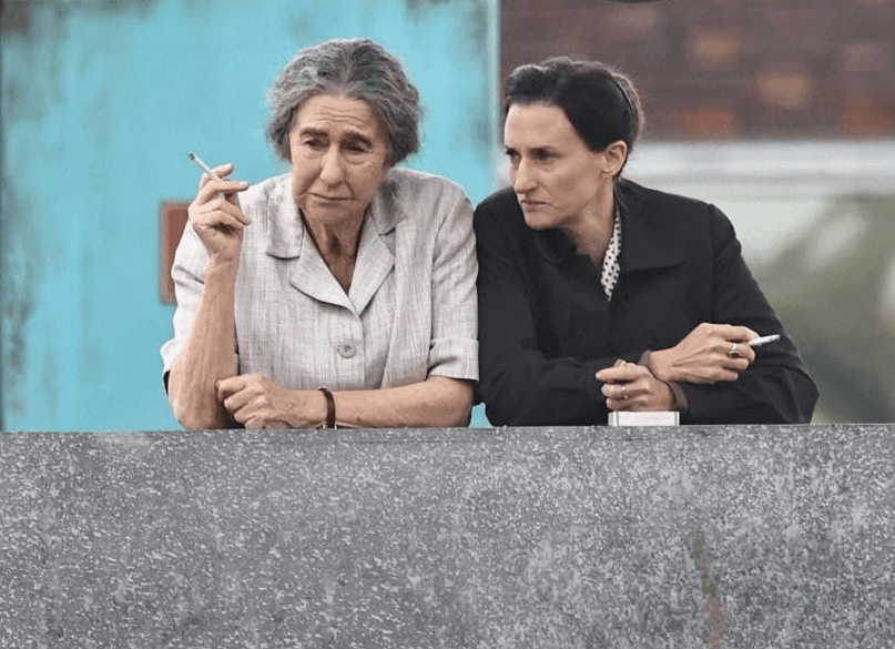 Golda Meir (Helen Mirren, L) and Lou Kaddar (Camille Cottin), in "Golda." (Bleeker Street)