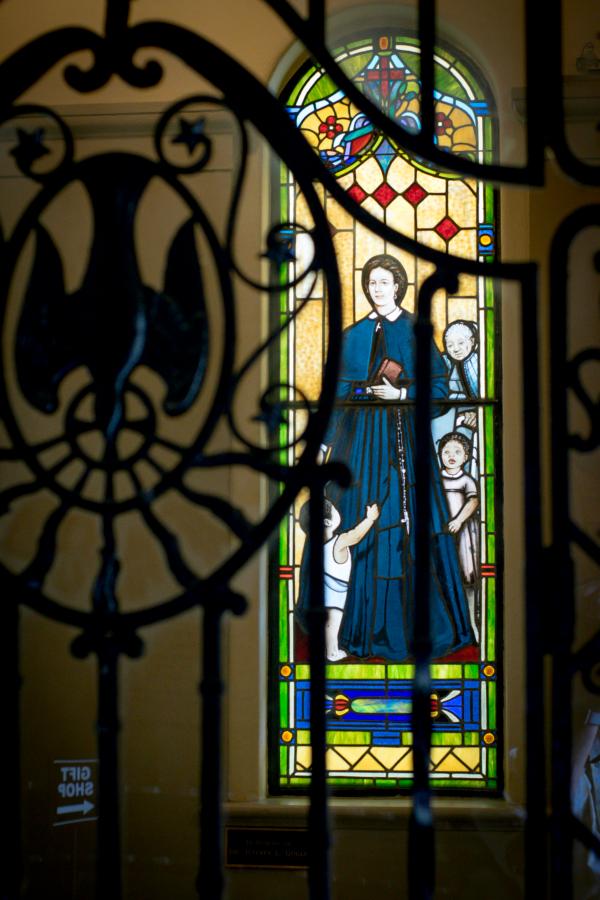 Many of the stained-glass windows at St. Louis Cathedral, such one showing St. Louis, for whom the cathedral is named, are about 100 years old. However, in 2015, the former baptistery of the cathedral was dedicated as the Venerable Henriette Delille Prayer Room with two newly commissioned stained-glass windows by local artist Ruth Goliwas. The stained glass communicates Delille's focus on bringing nonwhite children to the Catholic faith through baptism. (Courtesy of the Archdiocese of New Orleans)
