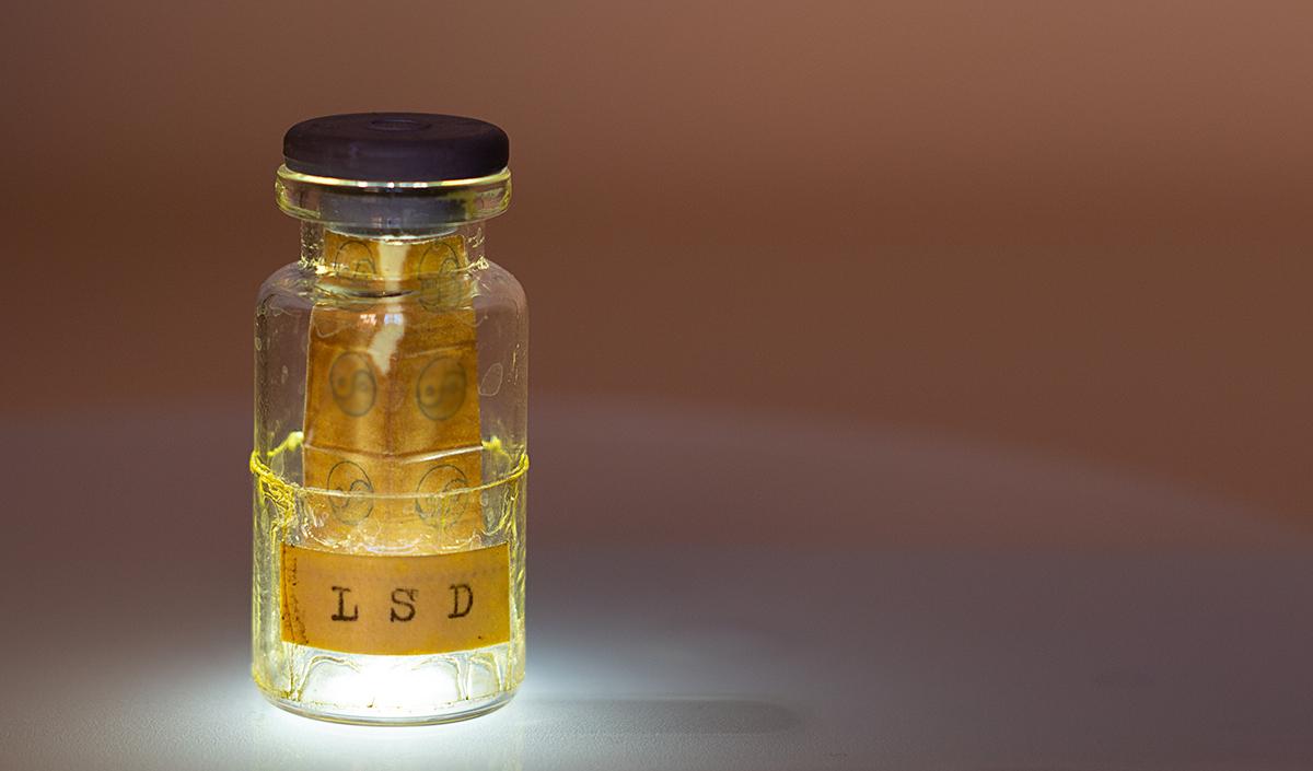 Old glass bottle containing hallucinogeni substance. (Sendo Serra/Shutterstock)