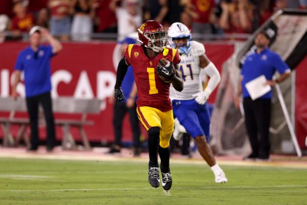 Zachariah Branch (1) of the USC Trojans runs with the ball against Taniela Latu (41) of the San Jose State Spartans during the third quarter at United Airlines Field at the Los Angeles Memorial Coliseum in Los Angeles on August 26, 2023. (Katelyn Mulcahy/Getty Images)
