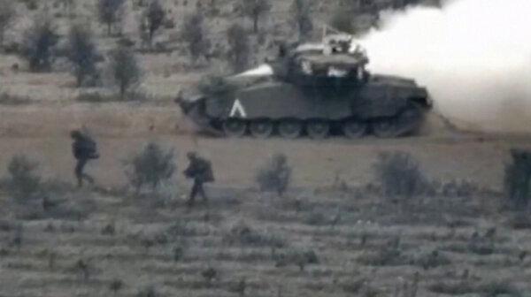 An Israeli tank in the Gaza Strip in a still from video released on Oct. 29, 2023. (Israel Defense Forces via Reuters/Screenshot via The Epoch Times)