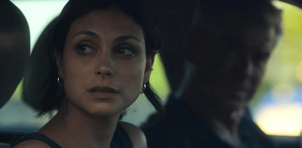 Marcie (Morena Baccarin) and Charlie (Pierce Brosnan), in “Fast Charlie.” (Vertical Entertainment)