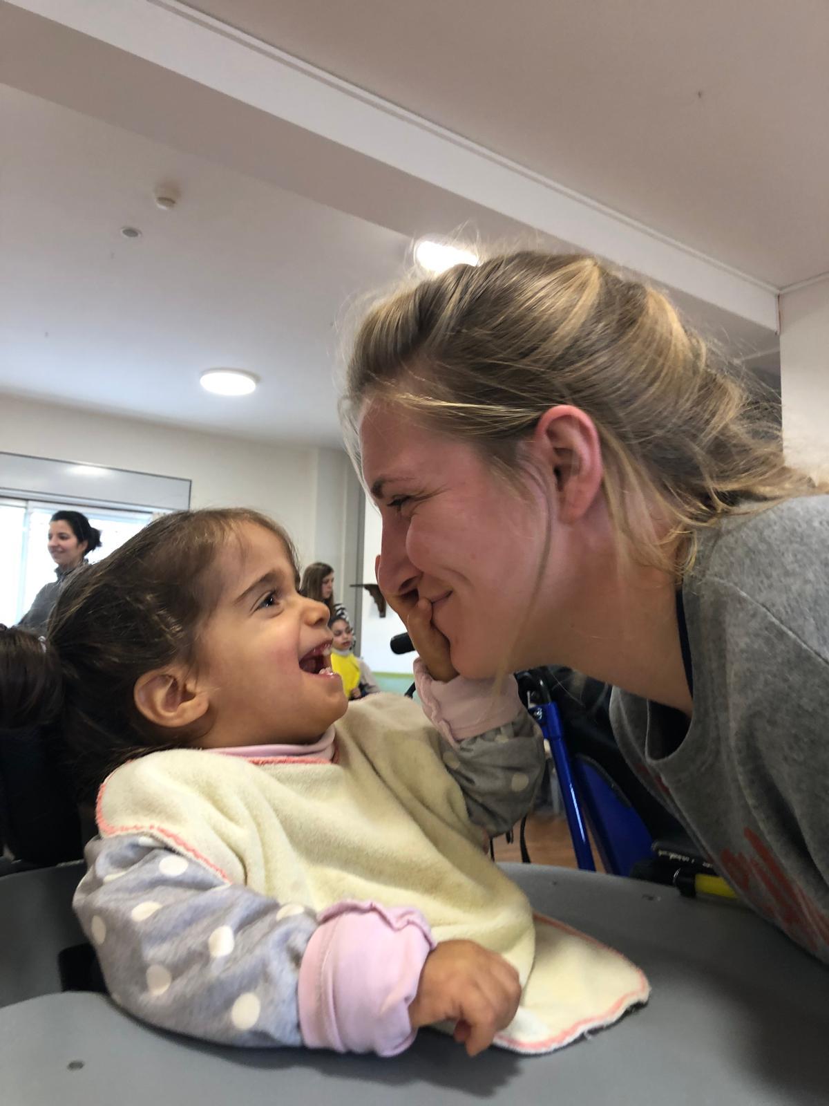 American nurse Elizabeth Wellendorf volunteers in the Hogar Ninos Dios group home for special needs children and adults in Bethlehem, West Bank. (Courtesy of Elizabeth Wellendorf)
