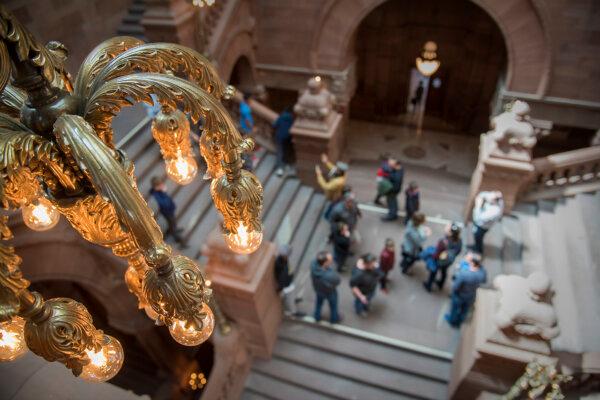The entryway stairwell was designed to be the main ceremonial feature of the Capitol. The stone carvings were designed by architect Isaac Perry. (New York State Office of General Services)