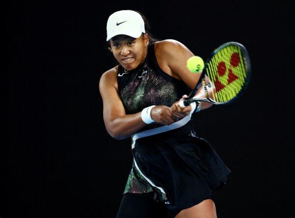 Naomi Osaka in action during an Australian Open match against Caroline Garcia in Melbourne, Australia, on Jan. 15, 2024. (Edgar Su/Reuters)