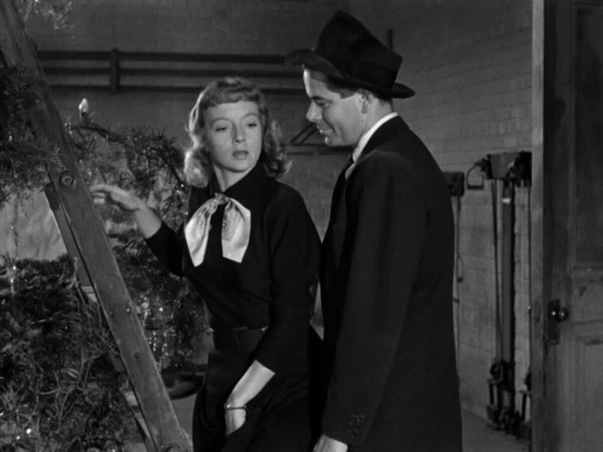 Joe Miracle (Glenn Ford) is now falling for something else with Jenny Jones (Evelyn Keyes), in “Mr. Soft Touch.” (Columbia Pictures)