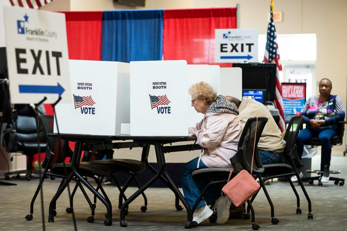 Voters use an optional paper ballot voting booth to cast their ballots early before the May 3 primary at the Franklin County Board of Elections in Columbus, Ohio, on April 26, 2022. (Drew Angerer/Getty Images)