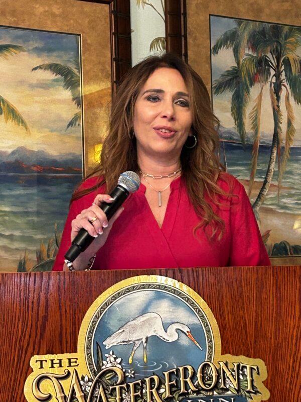 Michelle Utter, a health care professional, speaks at a press conference at The Villages in Florida, on January 26, 2024 (Patricia Tolson/The Epoch Times).
