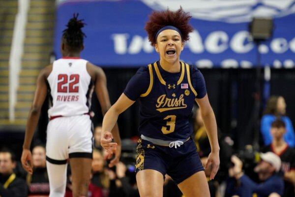 Notre Dame's Hannah Hidalgo celebrates after making a 3-point basket against North Carolina State in the Atlantic Coast Conference tournament championship game in Greensboro, N.C., on March 10, 2024. (Chuck Burton/AP Photo)