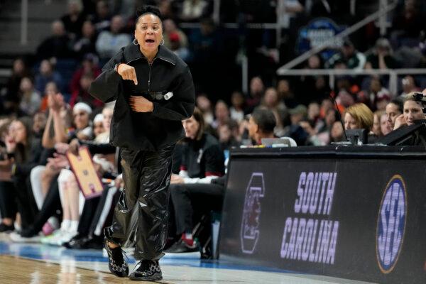 South Carolina Coach Dawn Staley motions to players during an NCAA Tournament game in Albany, N.Y., on March 31, 2024. (Mary Altaffer/AP Photo)